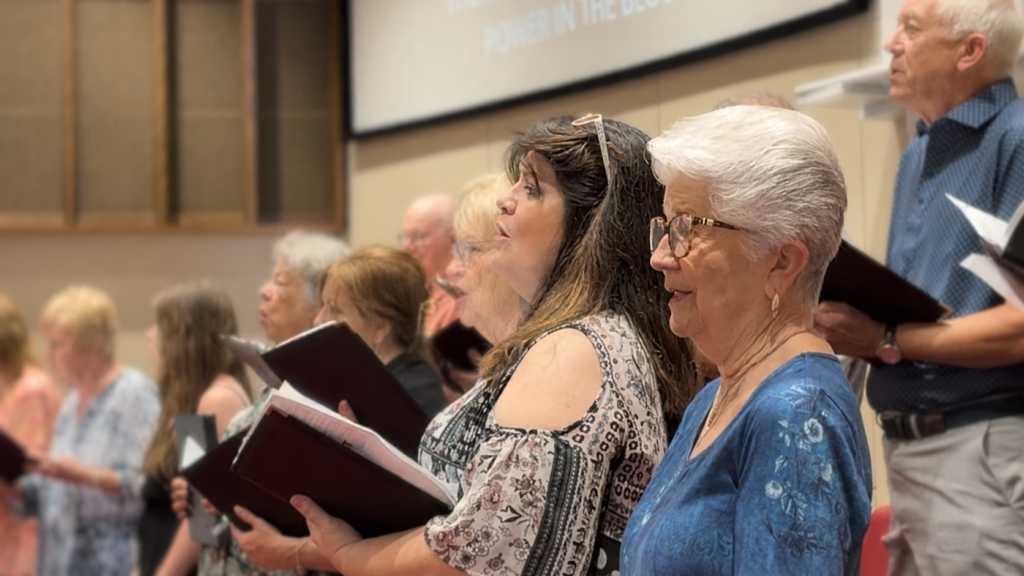 Choir leading worship through music at Clemmons First Baptist Church.